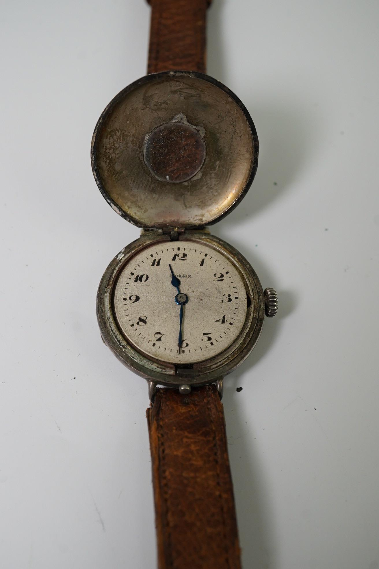 A gentleman's mid 1920's silver Rolex half hunter manual wind wrist watch